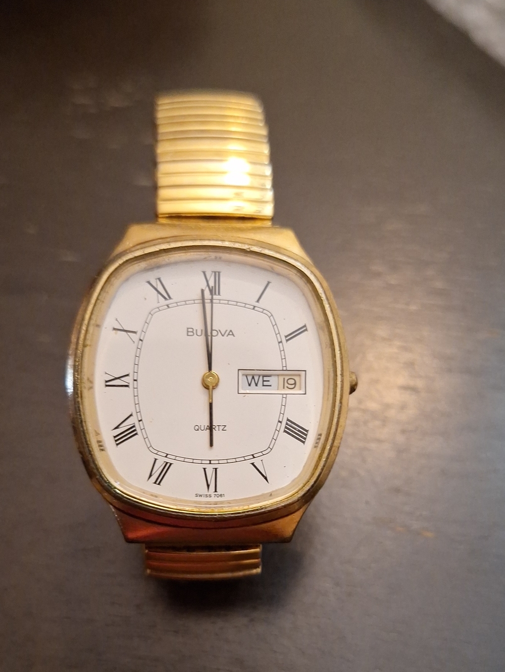 Bulova Gold and White Dress Watch with Roman Numerals